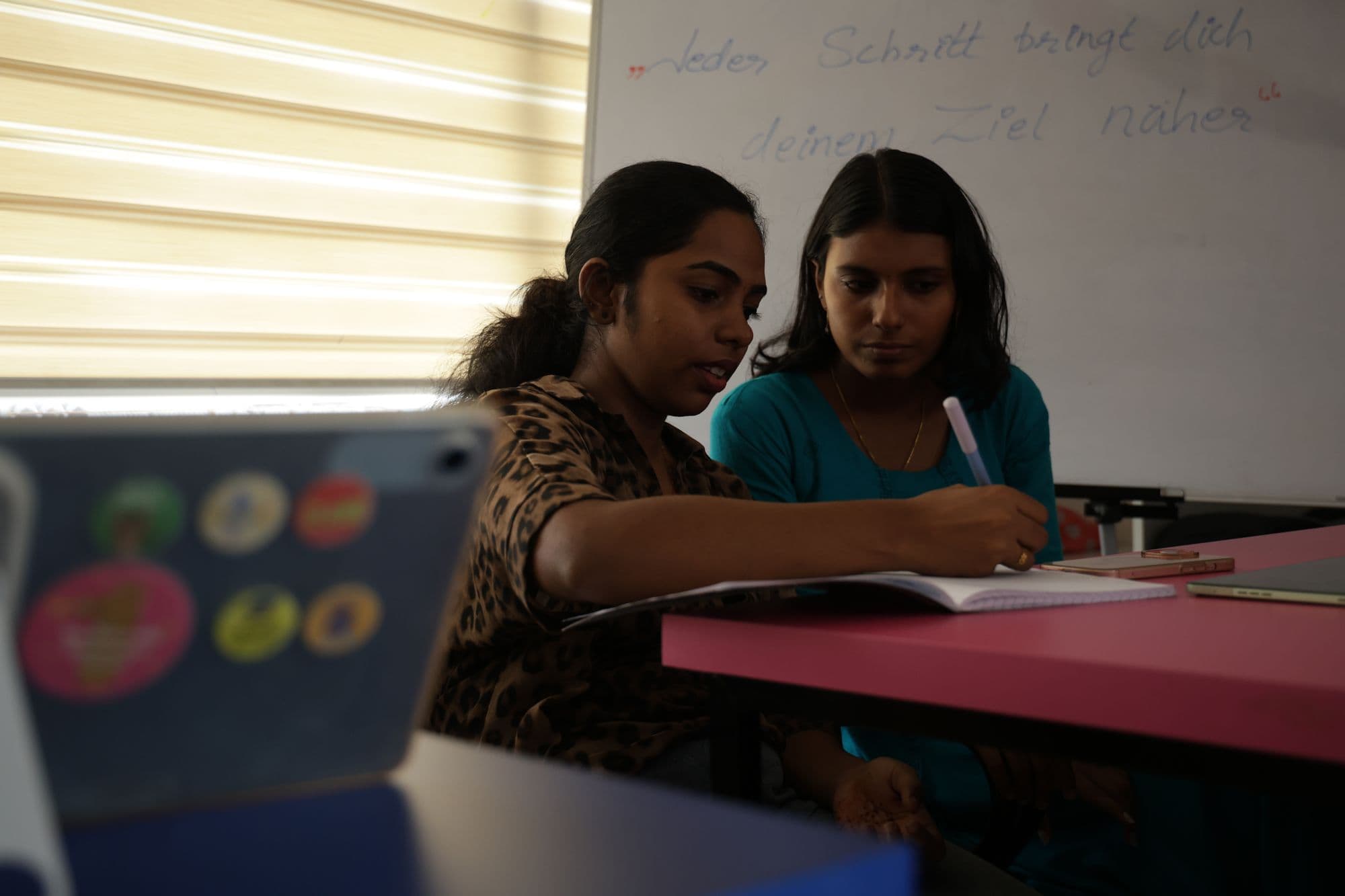 Two participants studying together